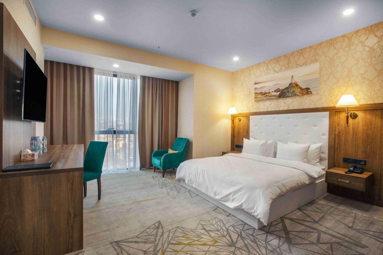 Royal Tulip Hotel & Casino, Tiflis Exterior foto Deluxe room